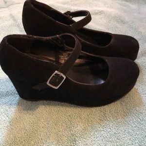 Little girls high heel wedge shoes.